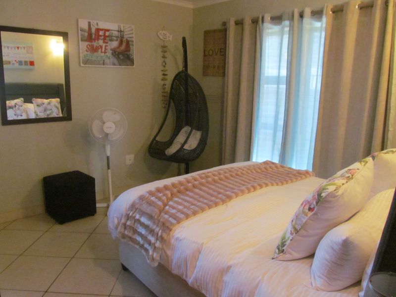 Spectacular Coastal Home with Lagoon & Ocean Views – Dual Living Potential - Photo 10