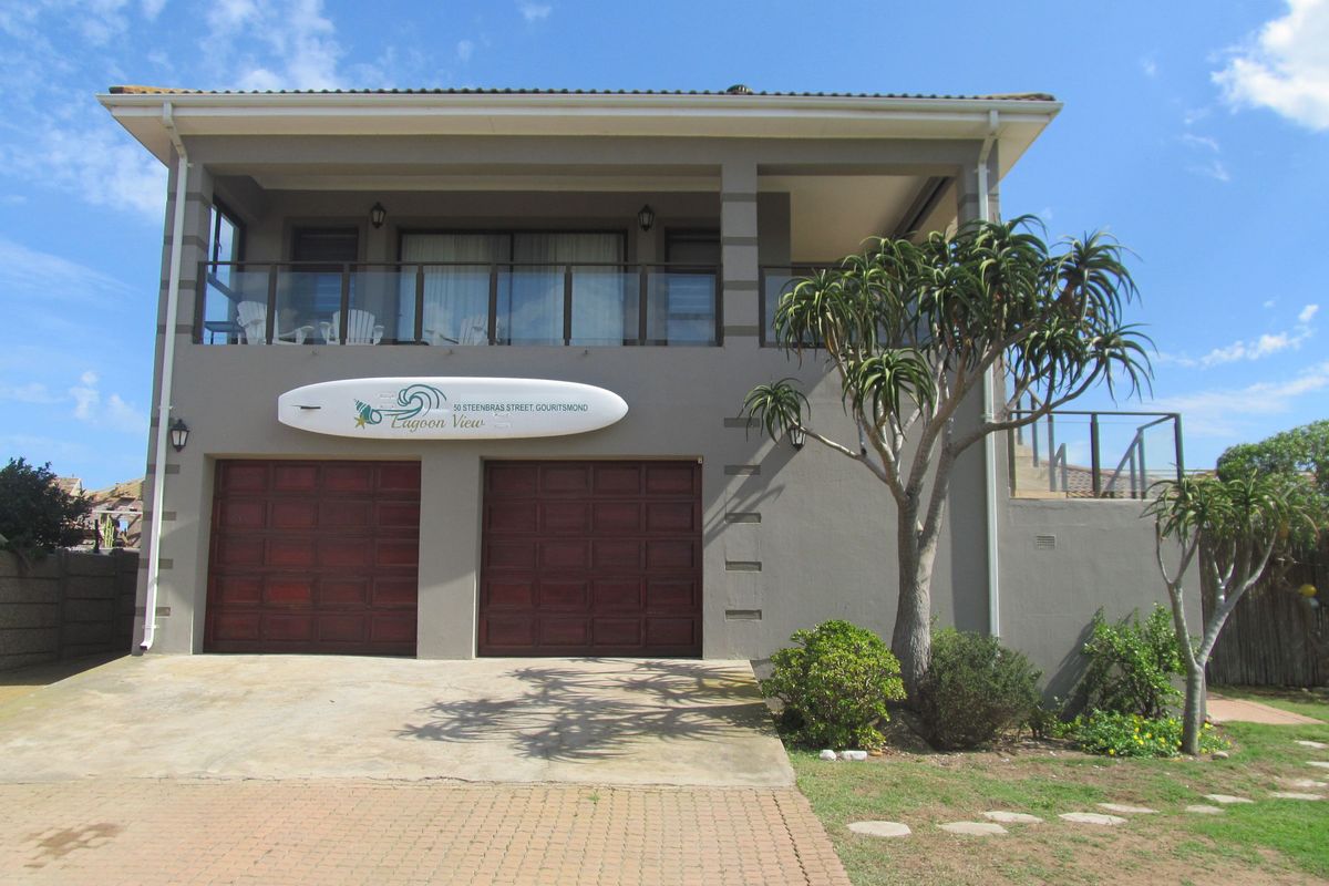 Spectacular Coastal Home with Lagoon & Ocean Views – Dual Living Potential - Photo 2