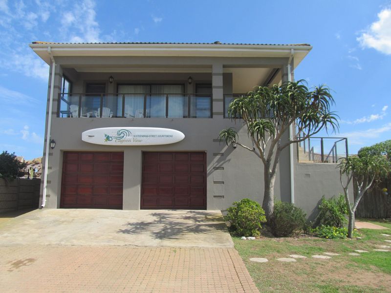 Spectacular Coastal Home with Lagoon & Ocean Views – Dual Living Potential - Photo 2