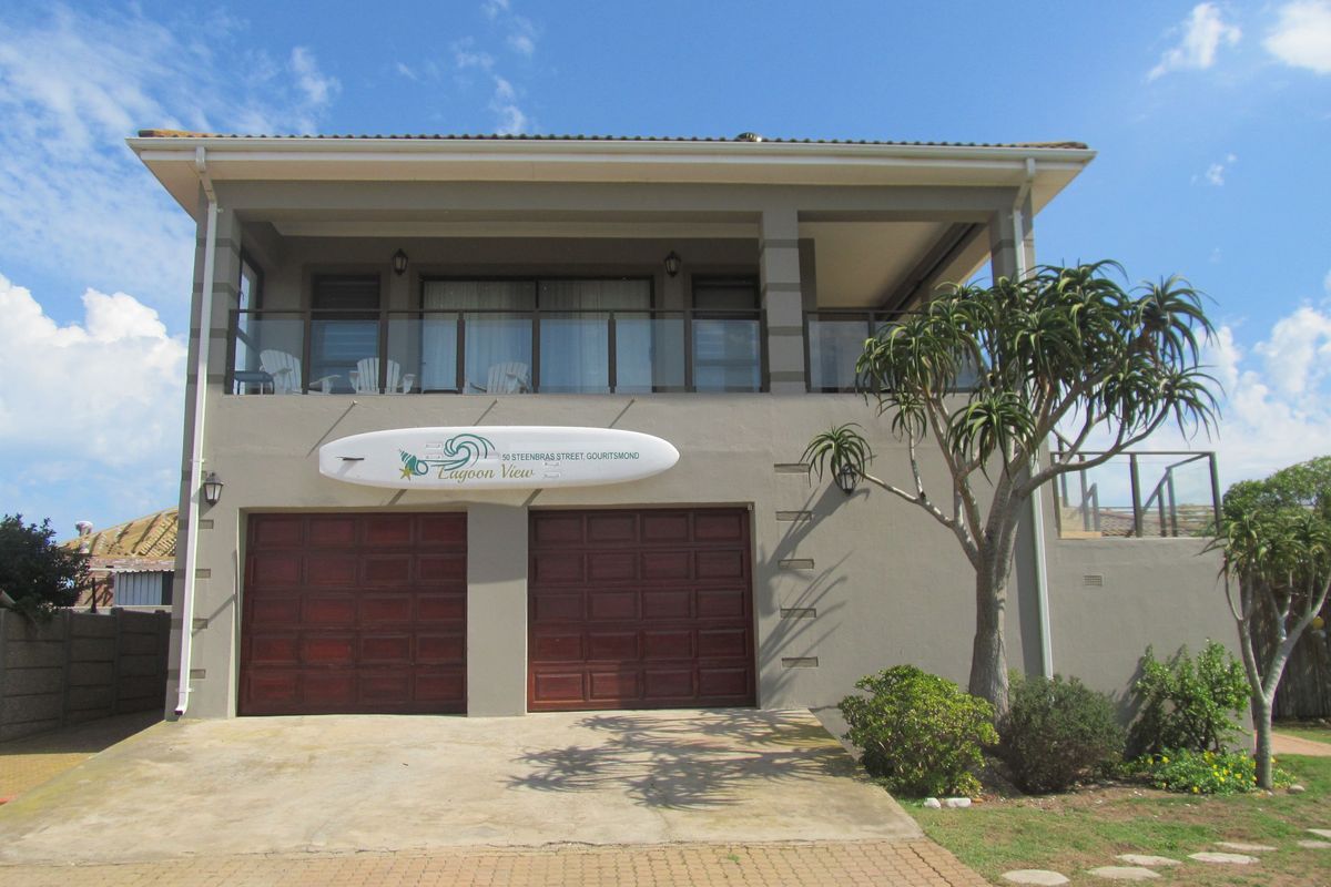 Spectacular Coastal Home with Lagoon & Ocean Views – Dual Living Potential - Photo 3