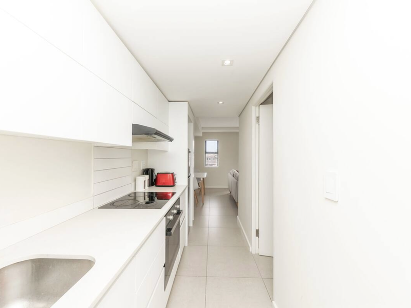 Bright and airy just one road from the beach - Photo 8