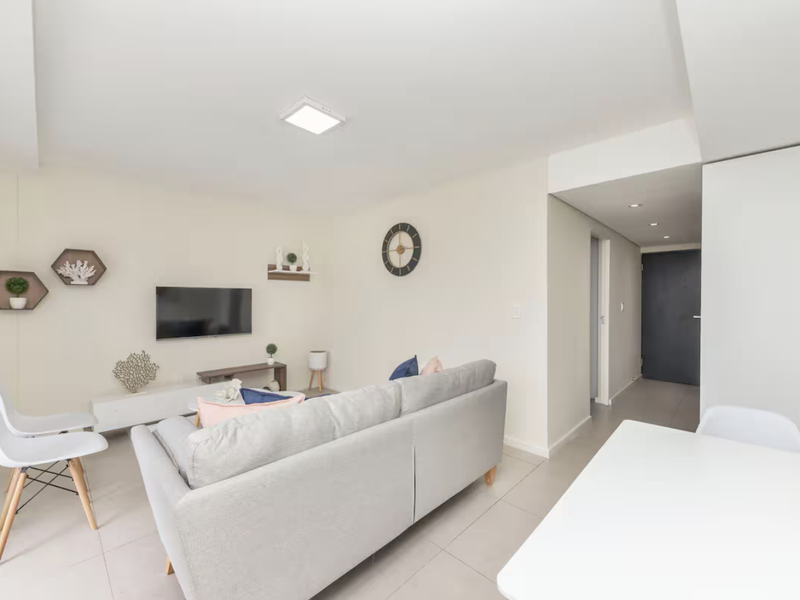 Bright and airy just one road from the beach - Photo 6