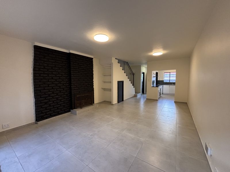 Modern, Move-In Ready Townhouse with Private Garden in Secure Complex - Photo 2