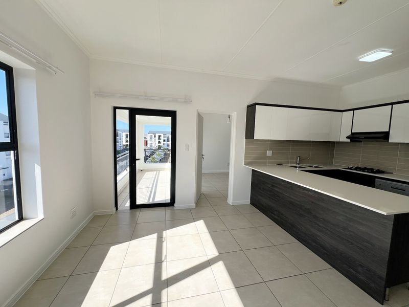 Top-Floor Luxury Living with Sunshine, Style & Unmatched Lifestyle Convenience - Photo 7