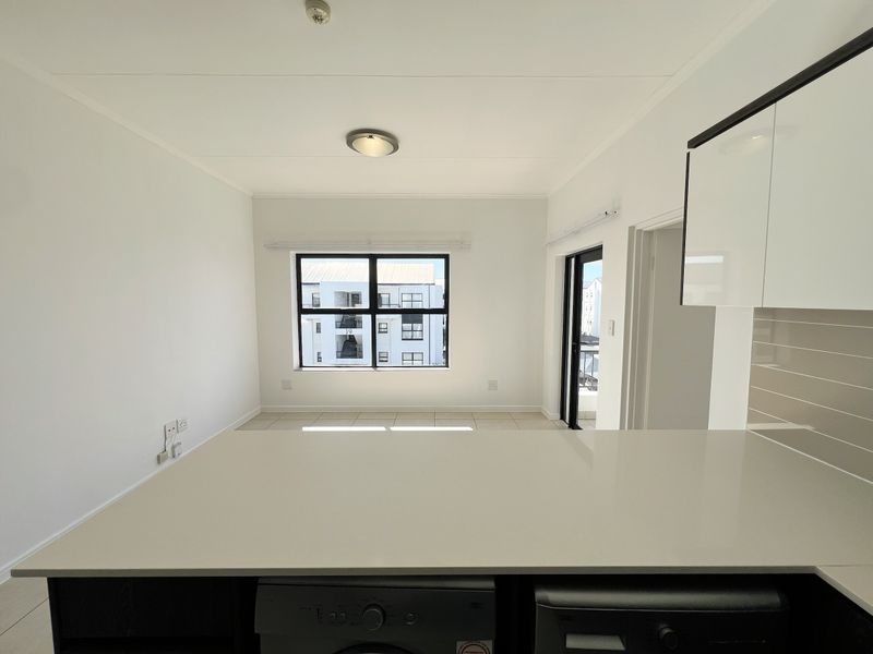 Top-Floor Luxury Living with Sunshine, Style & Unmatched Lifestyle Convenience - Photo 5