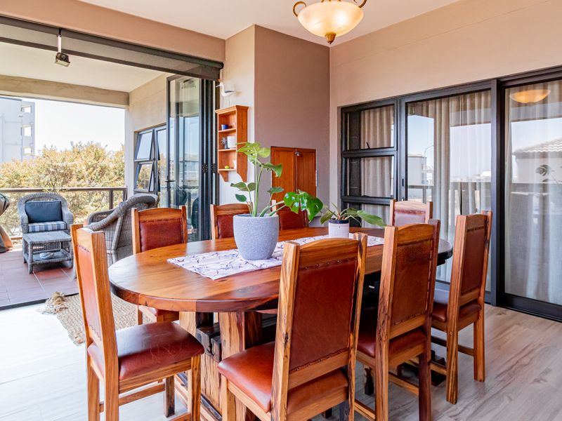 Spacious Coastal Living in Big Bay – Fully Furnished Apartment with Dual Balconies Near the Beach - Photo 3