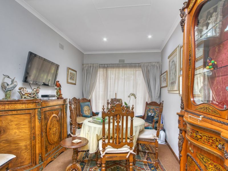 PRICE REDUCED....LARGE SECURE 8 BEDROOM FAMILY HOME AND A WORK FROM HOME OFFICE...A MUST TO SEE.... - Photo 10