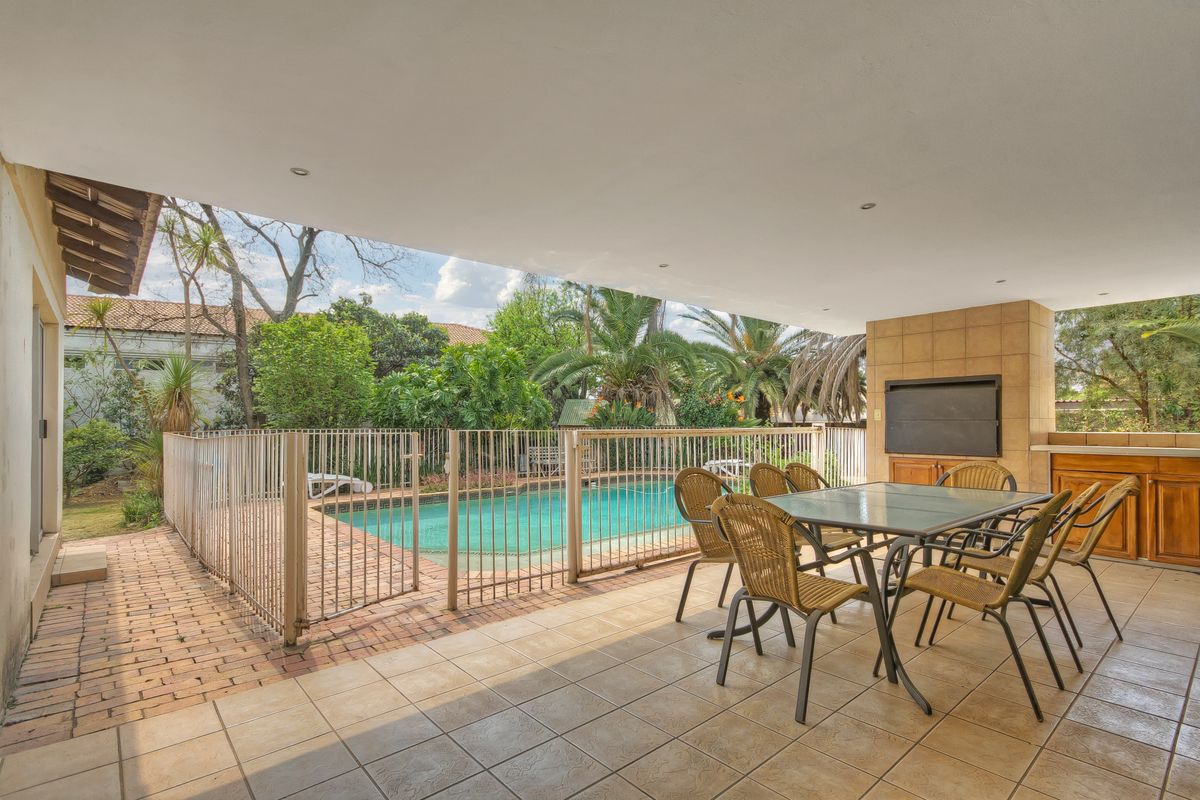 PRICE REDUCED....LARGE SECURE 8 BEDROOM FAMILY HOME AND A WORK FROM HOME OFFICE...A MUST TO SEE.... - Photo 2