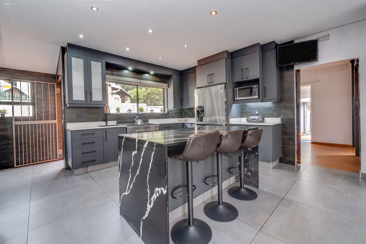 Versatile Family Home with Cottage, Entertainer’s Spaces & Income Potential - Photo 4