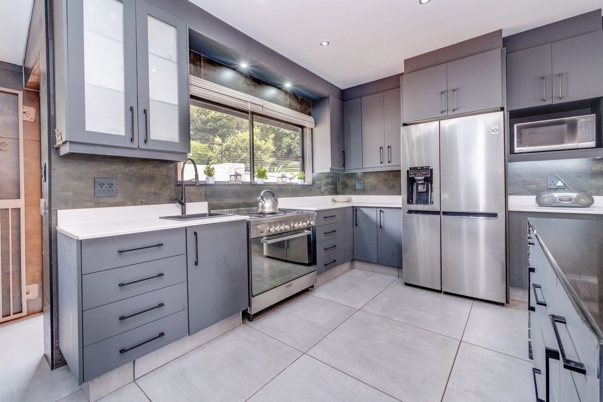 Versatile Family Home with Cottage, Entertainer’s Spaces & Income Potential - Photo 5