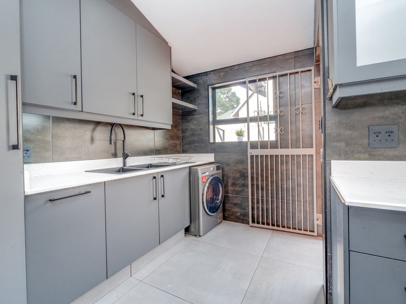 Versatile Family Home with Cottage, Entertainer’s Spaces & Income Potential - Photo 7