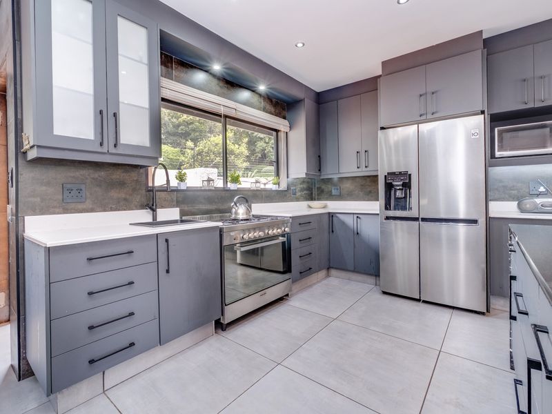 Versatile Family Home with Cottage, Entertainer’s Spaces & Income Potential - Photo 6