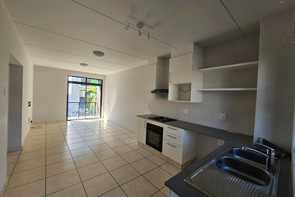 Modern Top Floor Apartment in Secure Complex for RENTAL! - Photo 4
