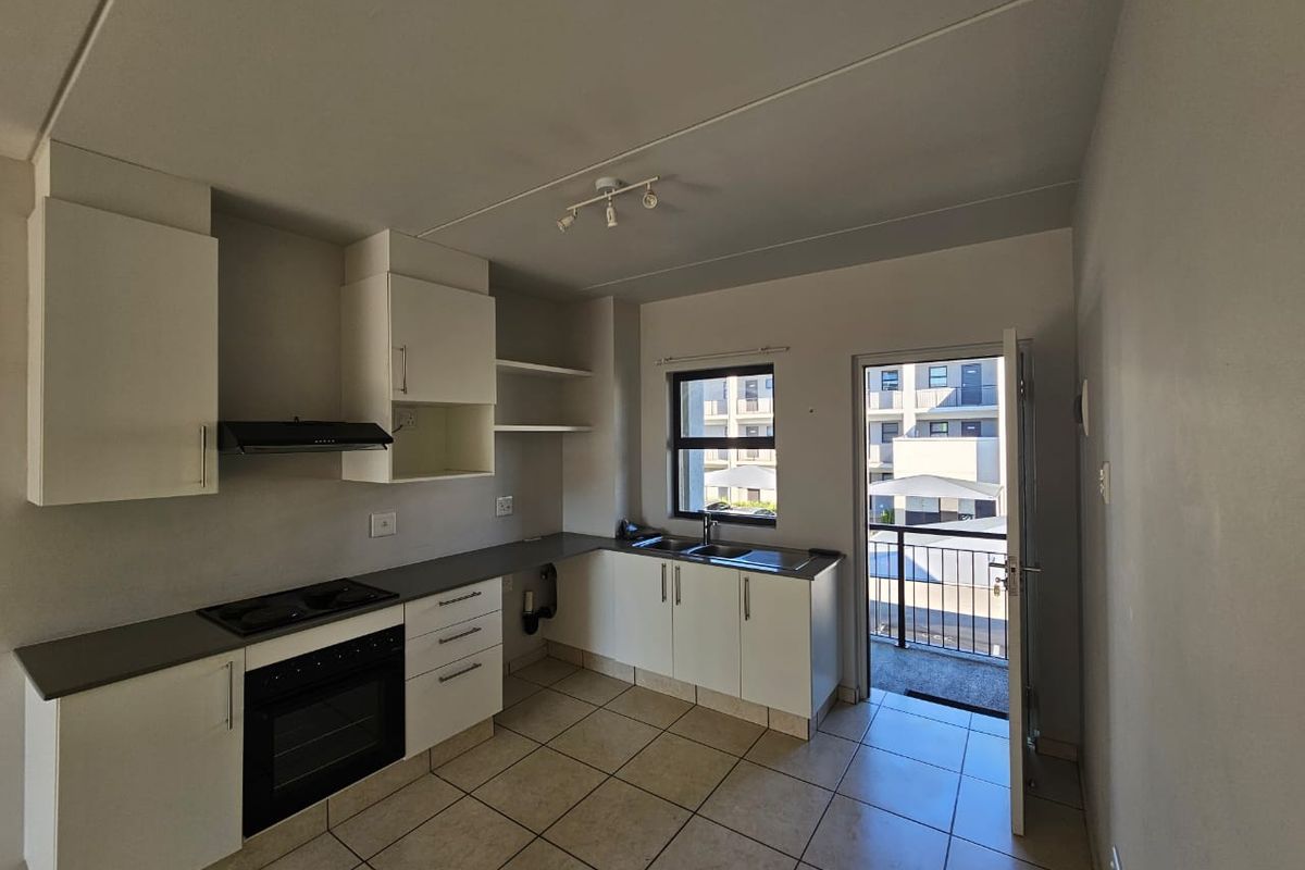 Modern Top Floor Apartment in Secure Complex for RENTAL! - Photo 3