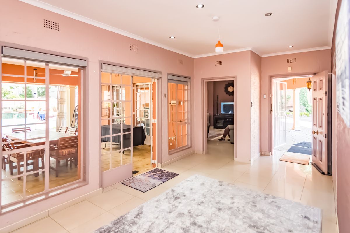 A TRULY SPECIAL DESIGNED FAMILY HOME WITH AN ABUNDANCE OF NATURAL LIGHT...... TUCKED AWAY - Photo 3