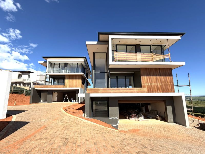CONTEMPORARY FREESTANDING HOME – ZIMBALI LAKES ESTATE - Photo 1