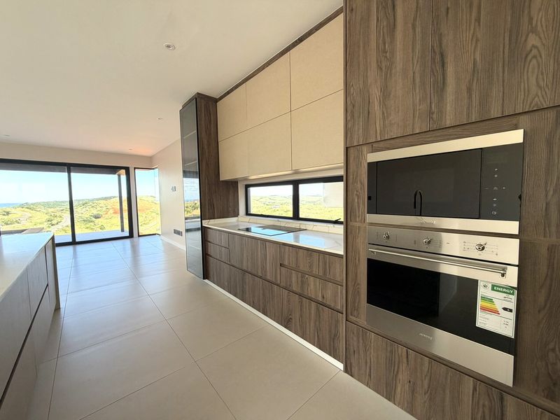 CONTEMPORARY FREESTANDING HOME – ZIMBALI LAKES ESTATE - Photo 10