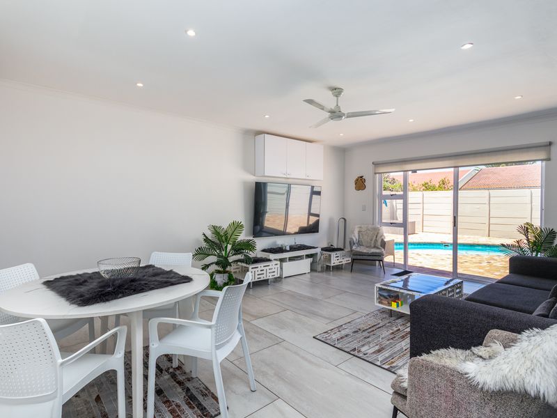 Beautifully Renovated 4-Bedroom Family Home with Pool, Security & Exceptional Outdoor Living - Photo 1