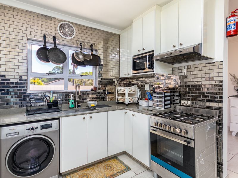 Beautifully Renovated 4-Bedroom Family Home with Pool, Security & Exceptional Outdoor Living - Photo 6