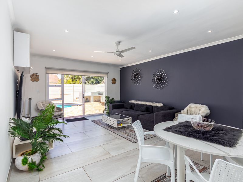 Beautifully Renovated 4-Bedroom Family Home with Pool, Security & Exceptional Outdoor Living - Photo 7