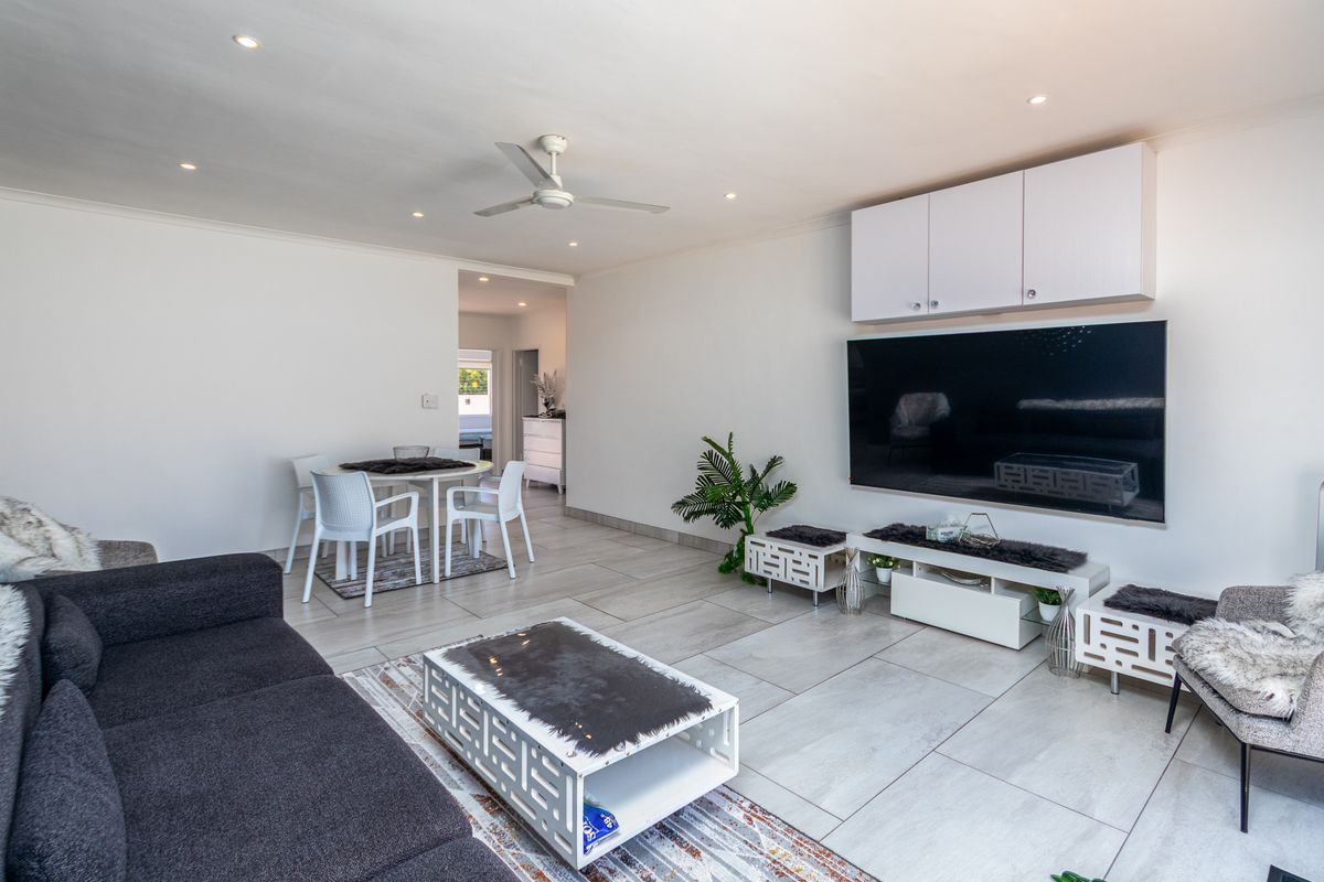 Beautifully Renovated 4-Bedroom Family Home with Pool, Security & Exceptional Outdoor Living - Photo 4