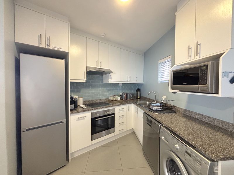Stylish Coastal Living – Fully Renovated & Move-In Ready - Photo 2