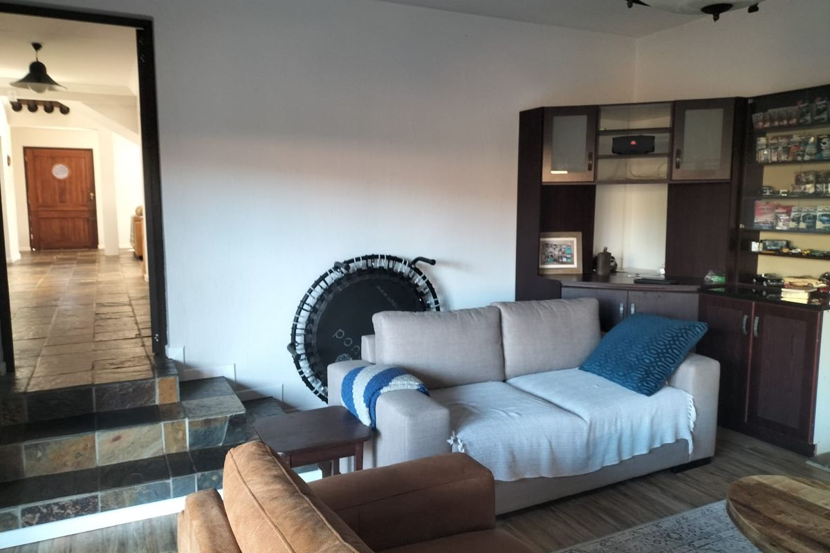 Immaculate Double-Storey Family Home with Multiple Entertainment Areas and Ample Parking - Photo 3