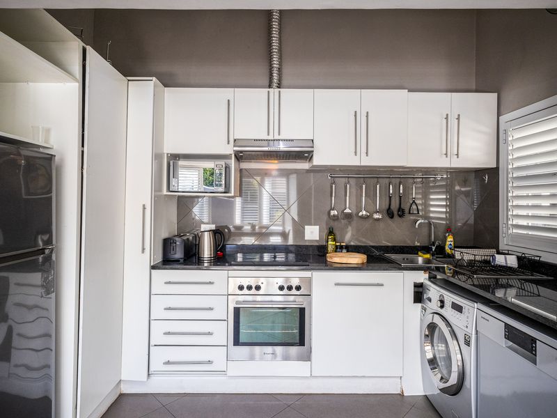 Contemporary Semi-Detached Home with Mountain Views & Proven Airbnb Income - Photo 6