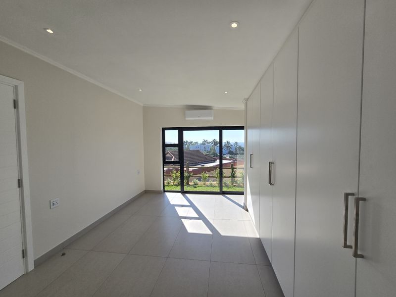 Brand-New Coastal Home with Spectacular 180° Sea Views - Photo 10