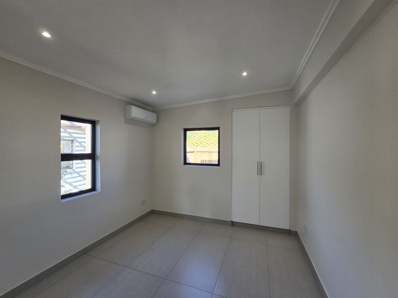Brand-New Coastal Home with Spectacular 180° Sea Views - Photo 9