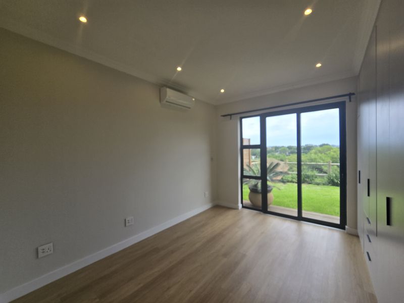 Modern 2-Bedroom Simplex in Santoza Village - Photo 9