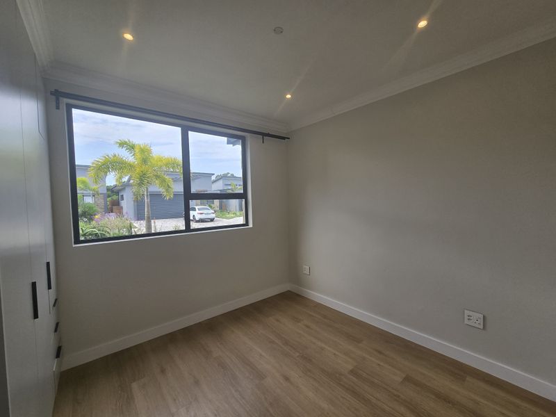Modern 2-Bedroom Simplex in Santoza Village - Photo 10