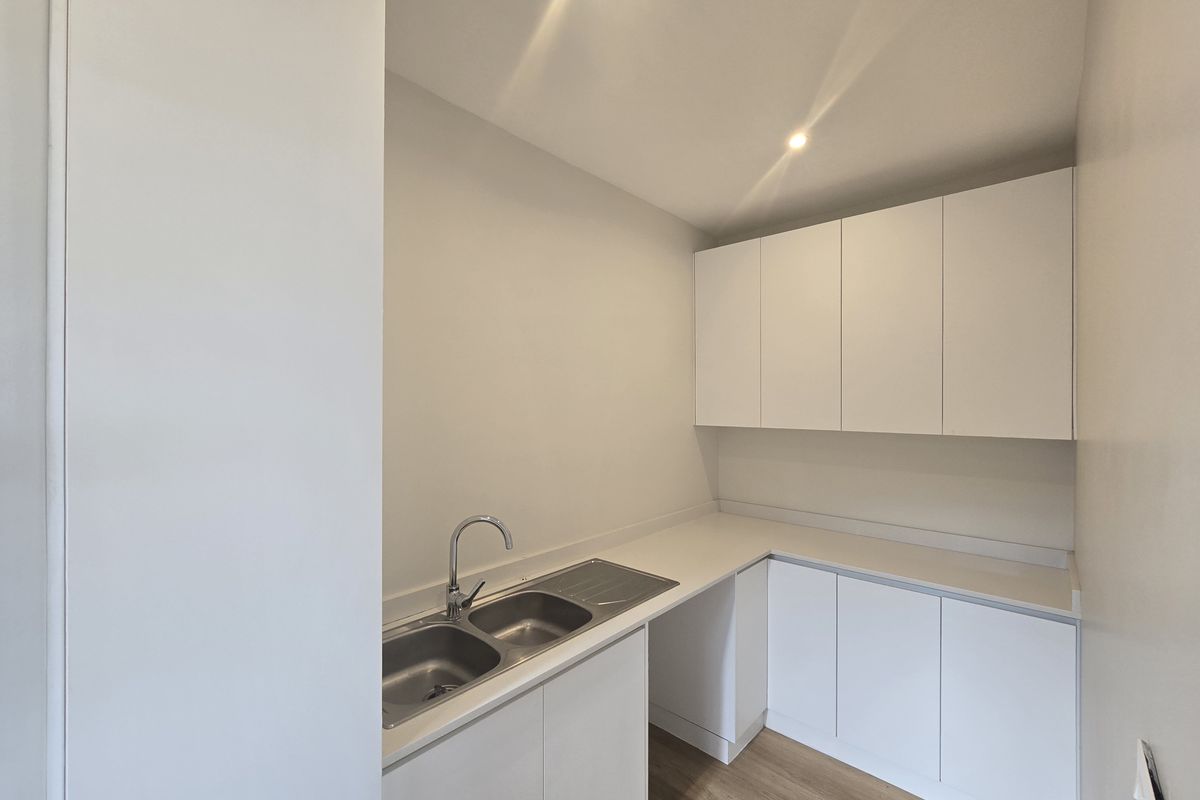 Modern 2-Bedroom Simplex in Santoza Village - Photo 4