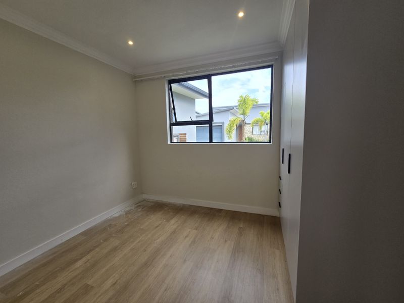 Spacious 2-Bedroom Simplex in Prime Coastal Santoza Village - Photo 10