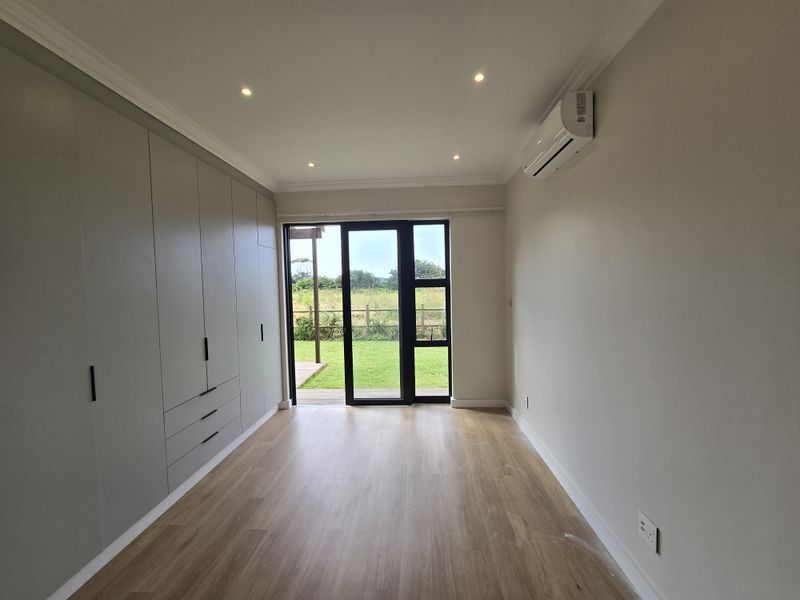 Spacious 2-Bedroom Simplex in Prime Coastal Santoza Village - Photo 9