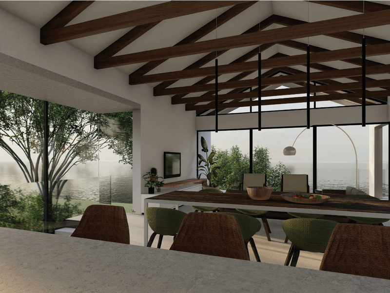 A modern open-plan living area featuring a vaulted ceiling with exposed timber beams and expansive floor-to-ceiling glass walls offering scenic views.