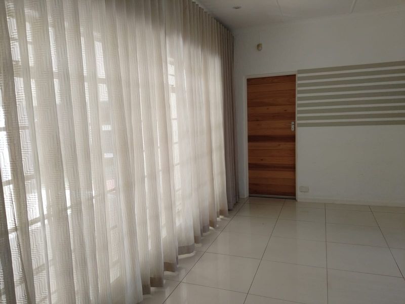 Elegant Double-Storey Family Home with Pool in Secure Enclosed Sandown - Photo 8