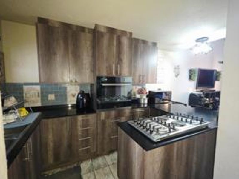 Charming Family Home in Secure Estate - Photo 3