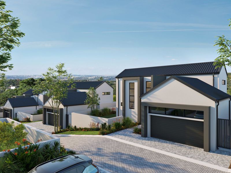 A modern cluster development featuring contemporary architectural design, paved driveways, integrated garages, and landscaped surroundings with a scenic elevated outlook.