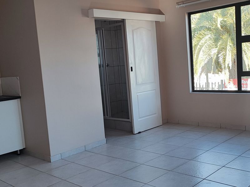 STUDIO UNIT AVAILABLE IN SMALL SECURE COMPLEX - Photo 8