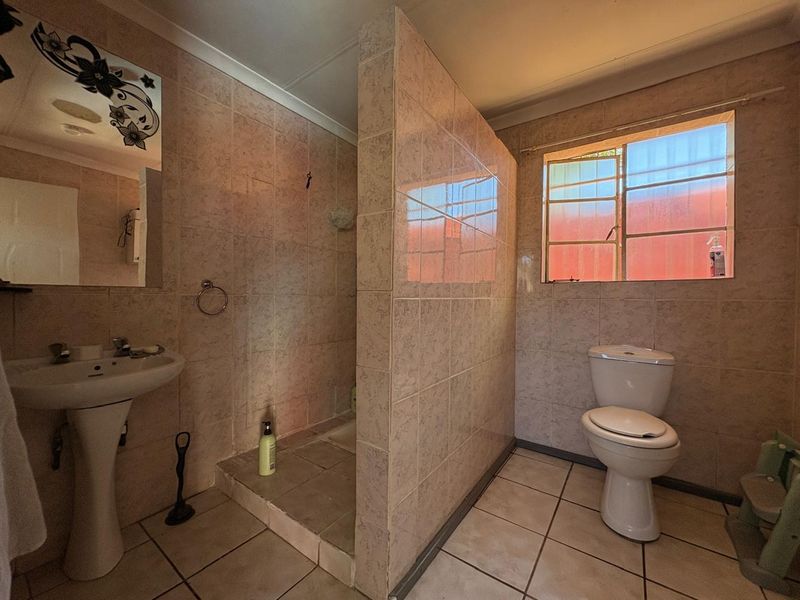 Investment Opportunity – 3 Bedroom Home with Two Income-Generating Flatlets - Photo 8