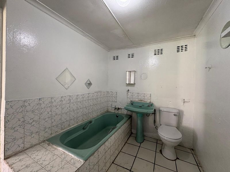 Investment Opportunity – 3 Bedroom Home with Two Income-Generating Flatlets - Photo 9