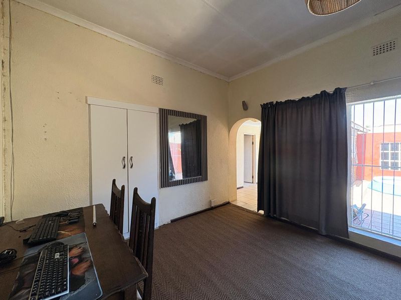Investment Opportunity – 3 Bedroom Home with Two Income-Generating Flatlets - Photo 4