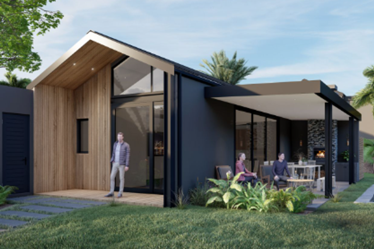 A modern rear exterior view featuring a covered patio with a built-in fireplace, timber cladding, and large sliding glass doors.