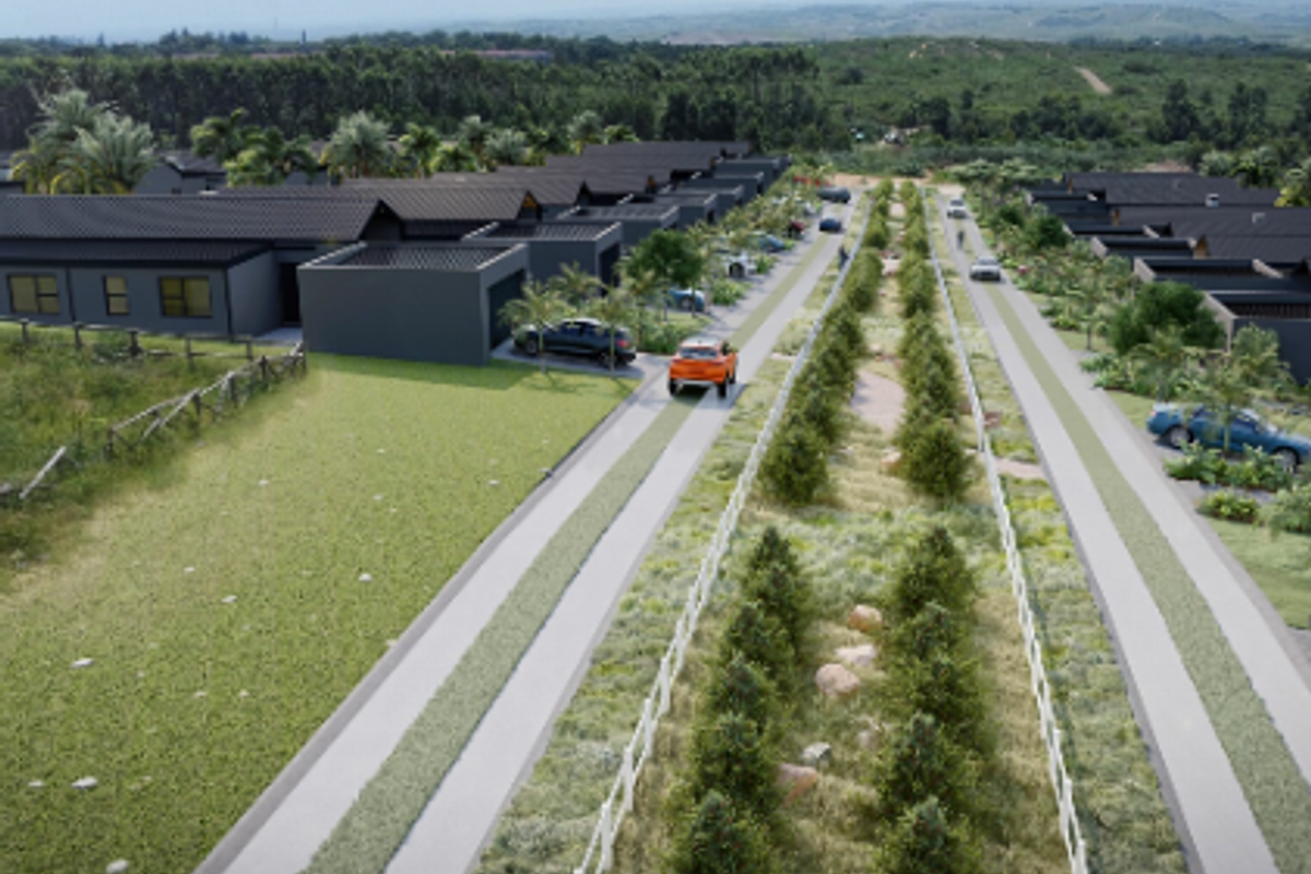 Aerial view of a residential estate featuring modern housing units, paved driveways, and landscaped green belts.