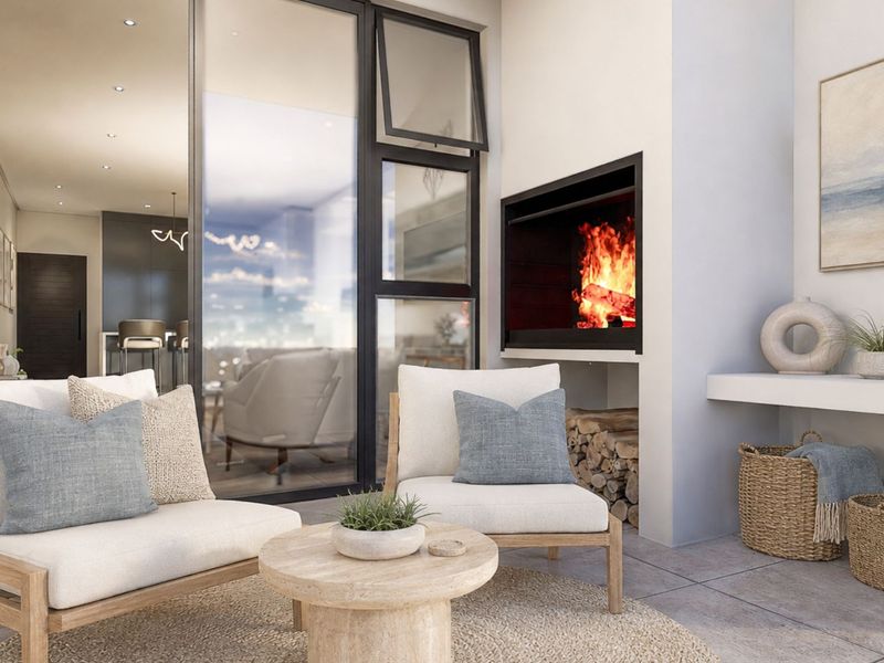 A modern covered patio featuring a built-in fireplace, tiled flooring, and large glass sliding doors providing seamless access to the interior living space.