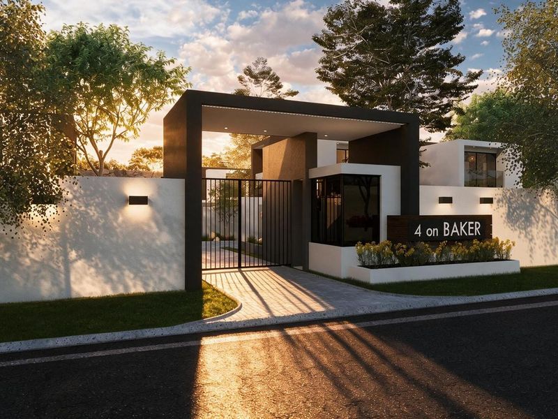 Modern gated entrance featuring a sleek architectural design, perimeter wall, integrated lighting, and clear signage for 4 on Baker.