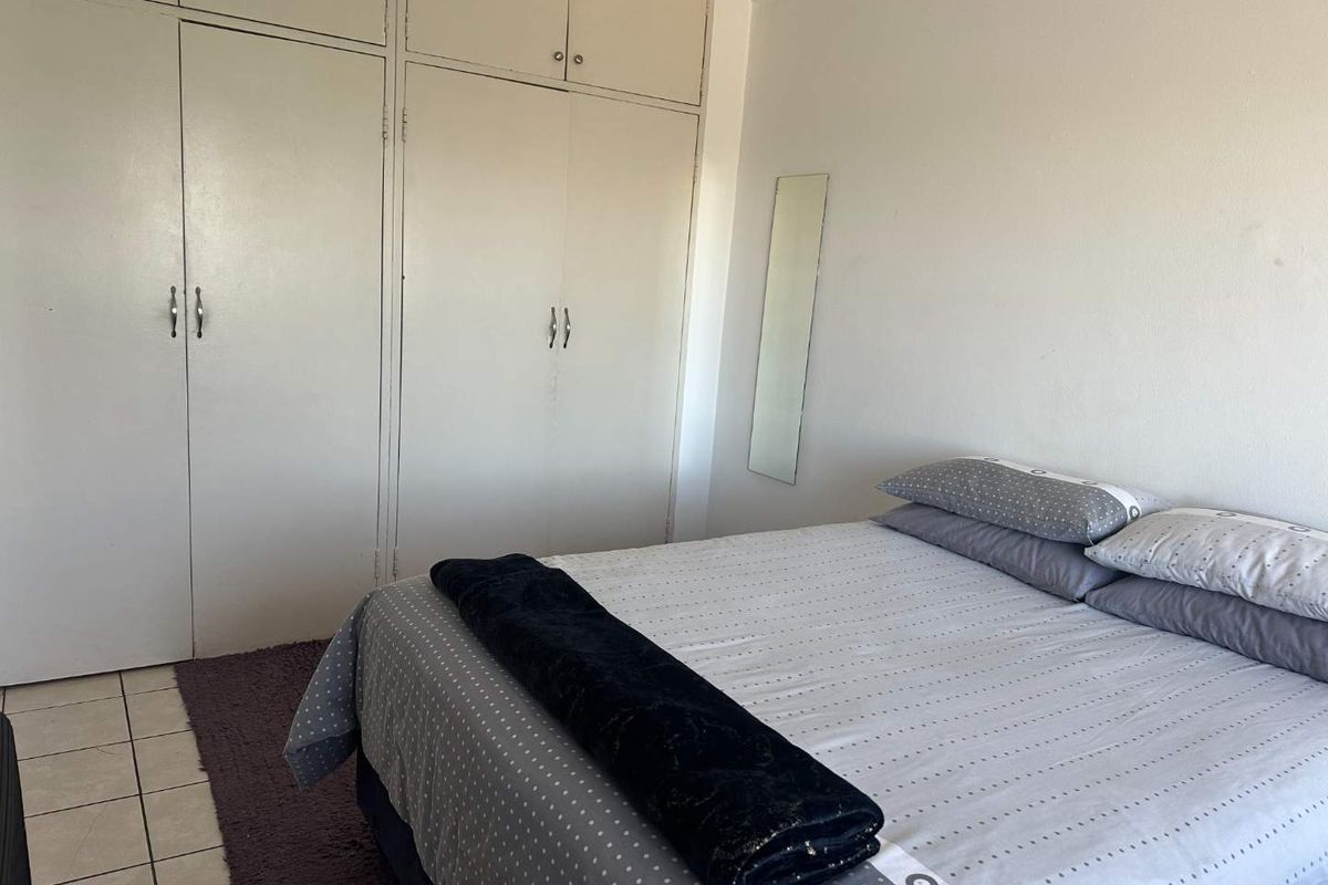 " 1 Bedroom in Well-Run secure Complex: Ideal for Comfortable Living" - Photo 5