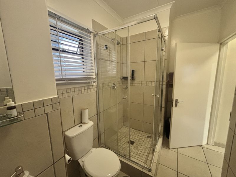 Charming 2-bedroom apartment for sale in Barbeque Downs, Midrand—perfect for modern living! - Photo 10