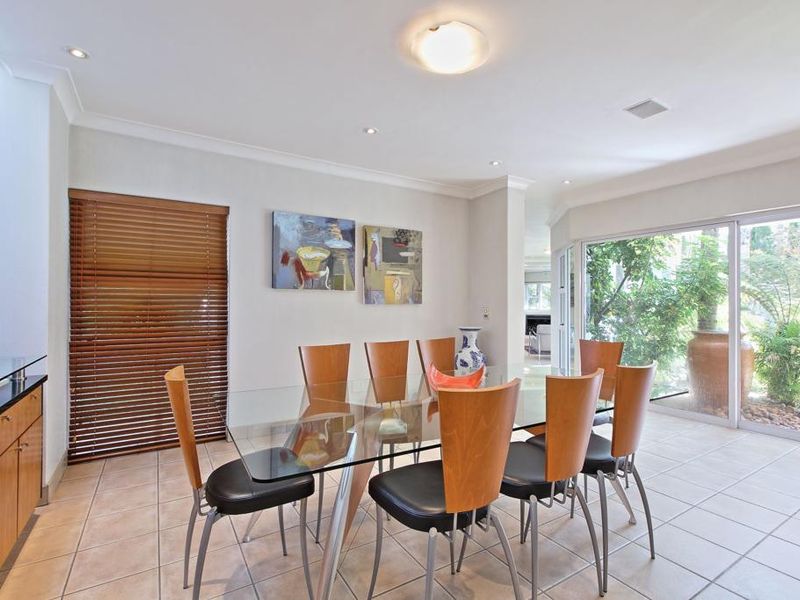 Charming 3-bedroom house in Morningside, Sandton, featuring modern amenities & a serene garden oasis - Photo 8